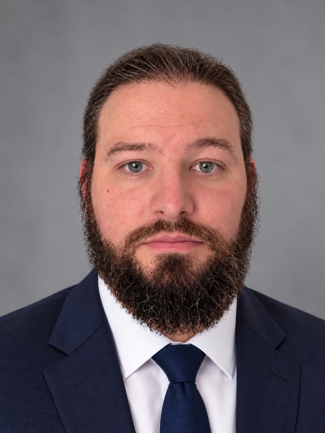 Professional portrait of Zach Cagle, Founder and Chief Executive Officer of Cagle Enterprises